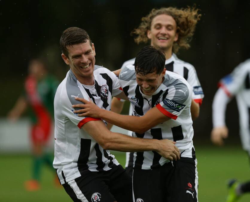 ROARING SUCCESS: Nathan Morris, left, celebrates a goal with Regan Lundy in the victory over Adamstown this season. Picture: Jonathan Carroll