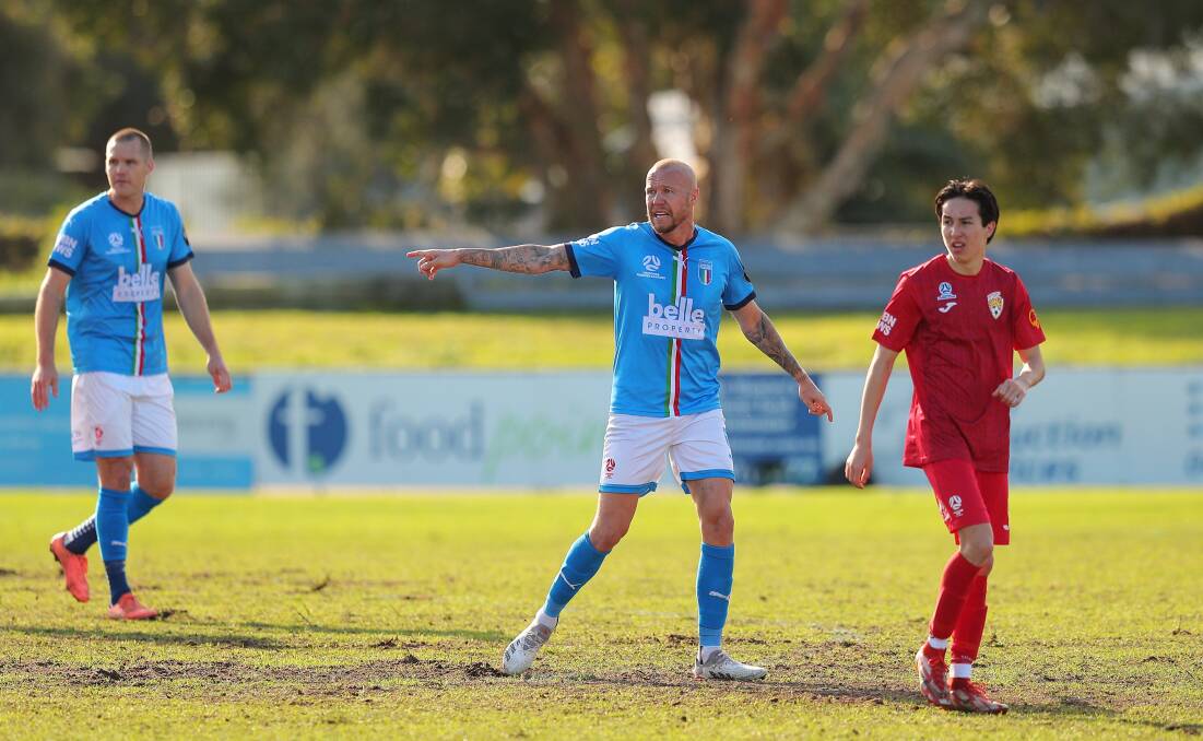 Nigel Boogaard and Taylor Regan in action for Charlestown against Broadmeadow this season. Picture by Max Mason-Hubers