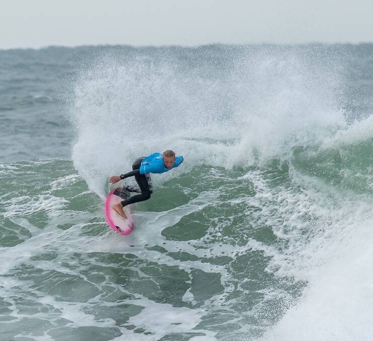 RIPPING: Merewether 13-year-old Felix Byrnes lays into a turn during his winning final in the under-16 NSW surfing titles. Pictures: Surfing NSW/JGRimages