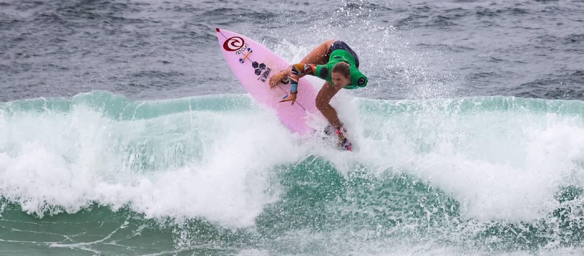 SMASH HIT: Shark attack survivor Bethany Hamilton in action at Merewether. 