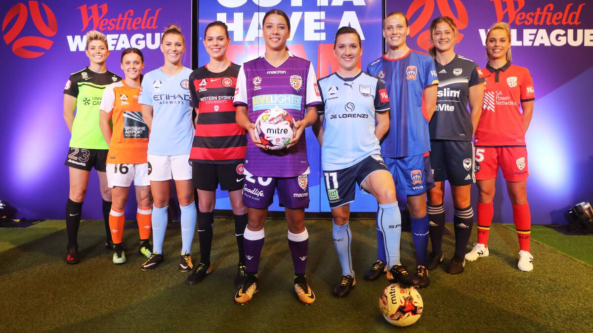 TAKE-OFF: Newcastle Jets star Emily Van Egmond, third from right, at the W-League season launch on Monday in Sydney. Picture: AAP.
(left to right) Michelle Heyman (Canberra), Hayley Raso (Brisbane), Steph Catley (City), Rosie Sutton (Wanderers), Sam Kerr (Perth), Lisa De Vanna (Sydney), Emily Van Egmond (Jets), Laura Alleway (Victory), Emma Checker (Adelaide). 