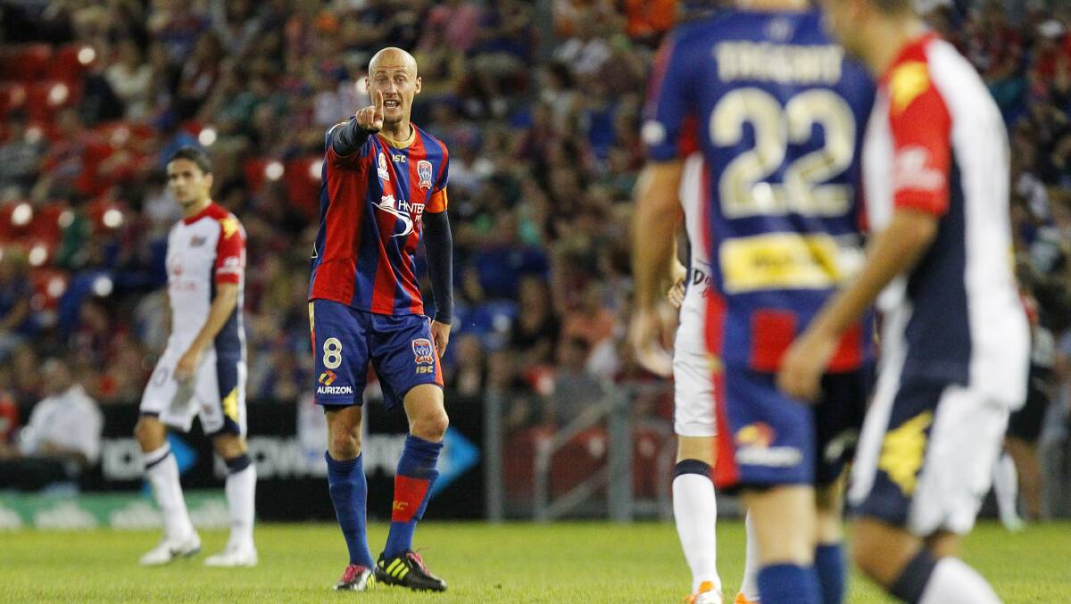 CHANGE IN DIRECTION: New Broadmeadow Magic coach Ruben Zadkovich playing for the Newcastle Jets in 2014. Picture: Max Mason-Hubers