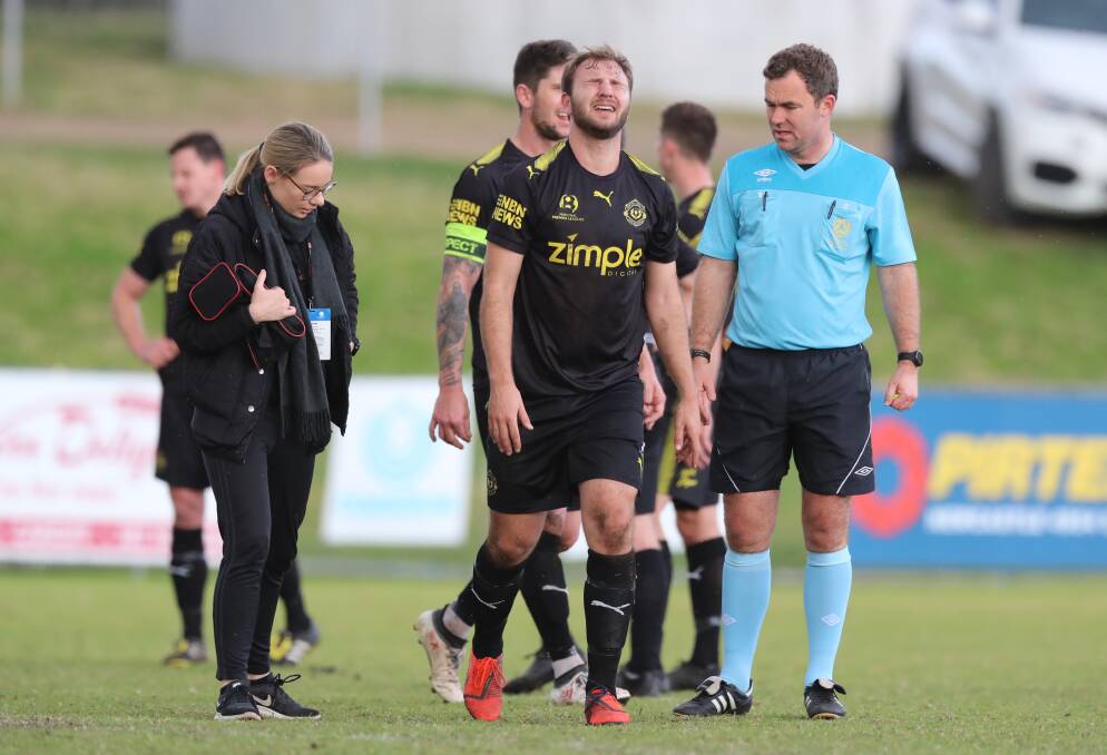 GONE: Michael Kantarovski leaves the pitch on Sunday. Picture: Sproule Sports Focus