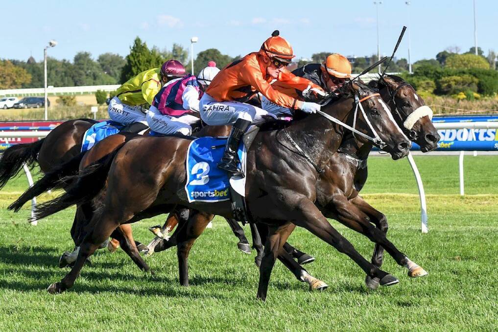 Brudenell, on the outside, winning at Caulfield on Saturday. Picture Inglis 