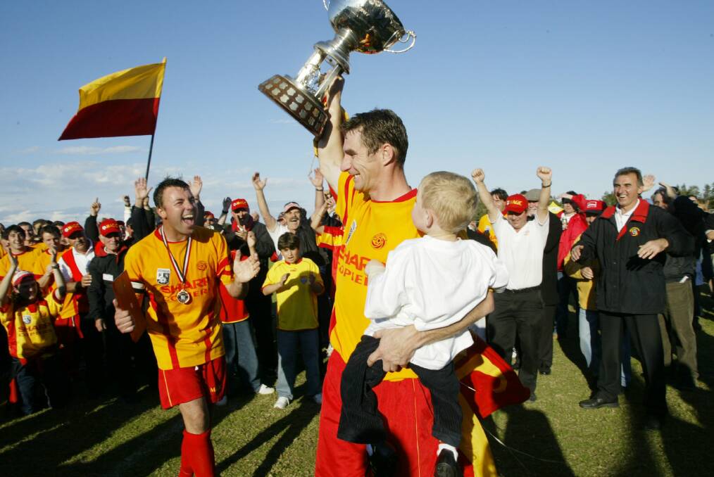 Jim Cresnar after Broadmeadow's 2004 Northern NSW State League grand final win over Weston. Picture by Ryan Osland