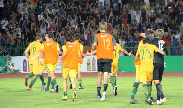Joeys players celebrate with Noah James, right, after the penalty shoot-out win.
