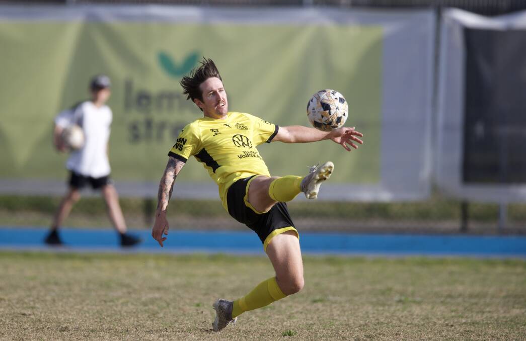 Kale Bradbery scoring the opening goal for Lambton Jaffas on Saturday against Cooks Hill at Fearnley Dawes Athletics Field. Picture Sproule Sports Focus