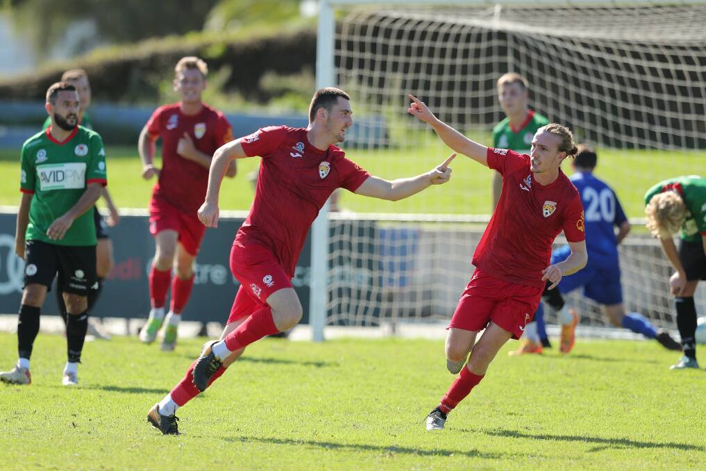 ON TARGET: Jacob Dowse, left, celebrates a goal in the 6-0 NNSW NPL victory against Adamstown Rosebud at Magic Park on April 10 this year. Picture: Max Mason-Hubers