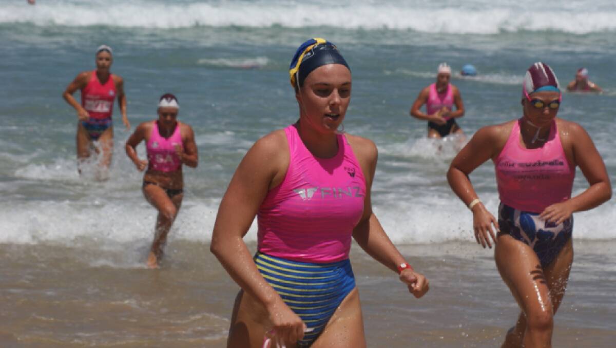 CHAMPION: Jessica Collins leads the pack in a Summer of Surf swim contest in 2014-15. Picture: Summer Of Surf