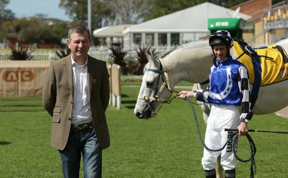 WINNERS: Newcastle trainer Kris Lees and jockey Andrew Gibbons, who is pictured sporting the Australian Bloodstock colours. Picture: Simone De Peak