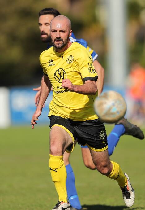 TIGHT BATTLE: Lambton Jaffas flyer James Virgili on the attack against Newcastle Olympic in their 1-1 draw on Sunday at Darling Street Oval. Picture: Max Mason-Hubers