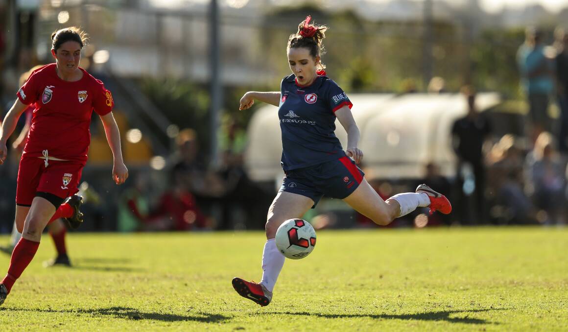 TAKING AIM: Rhali Dobson in action for Merewether in the Herald Women's Premier League last season. Picture: Marina Neil