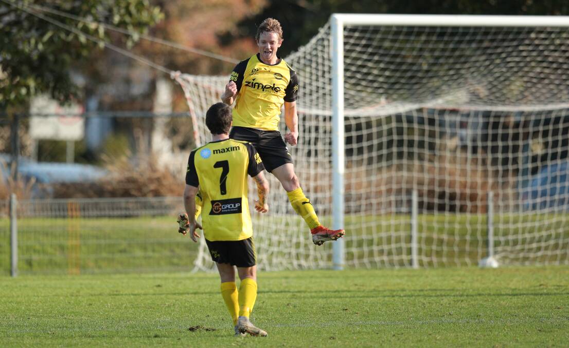 BACK TO EARTH: Luke Remington celebrates an equaliser for Lambton Jaffas against Broadmeadow on Saturday in their 3-2 loss at Edden Oval. Picture: Max Mason-Hubers