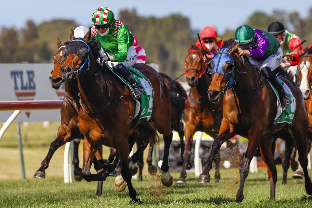 IN CONTROL: Kathy O'Hara and Commando Hunt, left, taking out the Highway Handicap at Kembla Grange on Saturday. Picture: Mark Evans/Getty Images