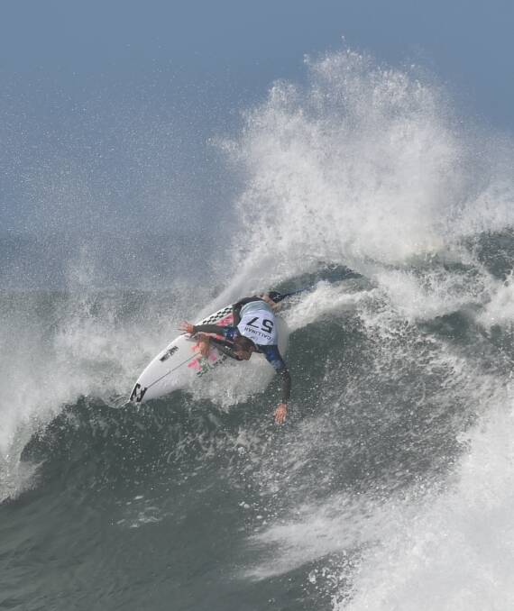 POWERHOUSE: Ryan Callinan hits the lip to finish and score an 8.6 on Friday in huge swell at Bells Beach during his win over American Conner Coffin. Picture: AAP