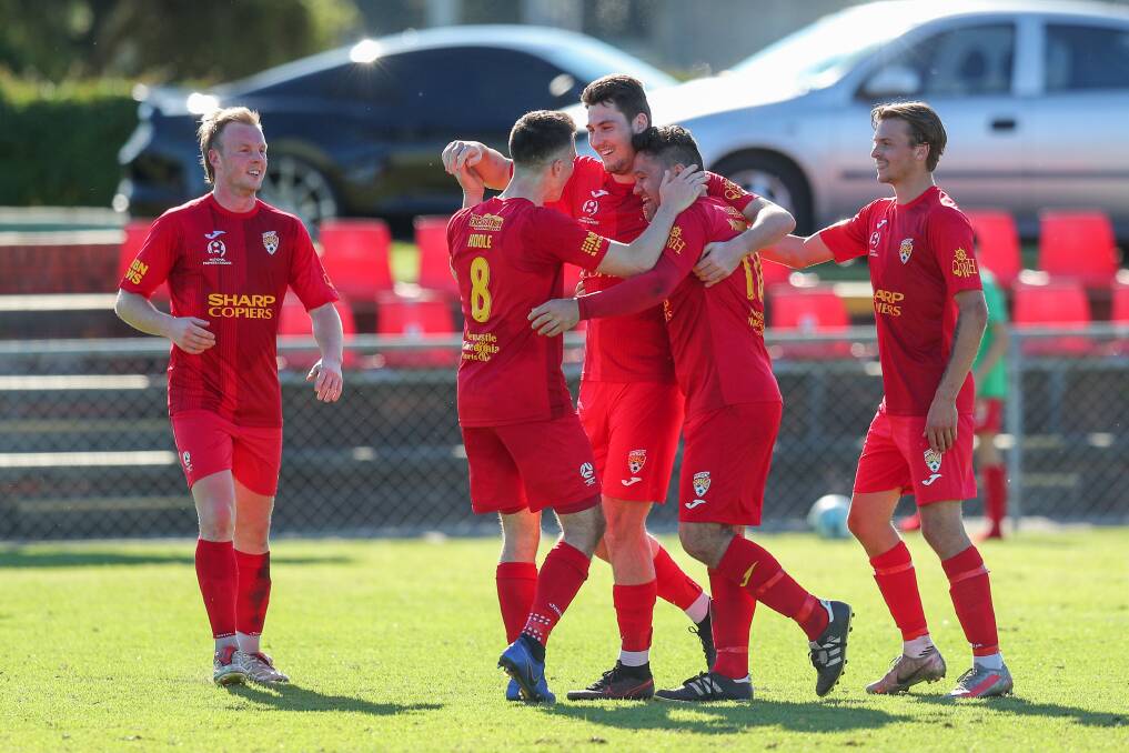 IN COMMAND: Broadmeadow celebrate a goal to John Majurovski on the stroke of half-time on Saturday in the 4-2 win over Weston. Picture: Max Mason-Hubers