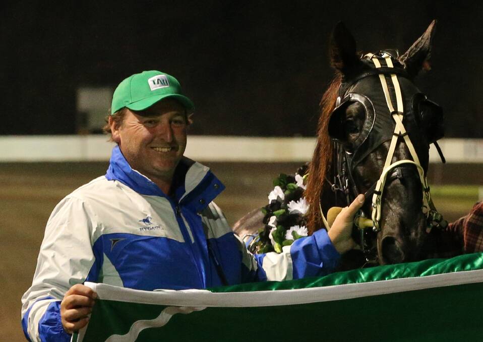 CHAMPION: Nulkaba trainer Clayton Harmey after his win in the group 1 Hunter Region Championship with Kanye Crusader in May at Newcastle Paceway. Picture: Simone De Peak