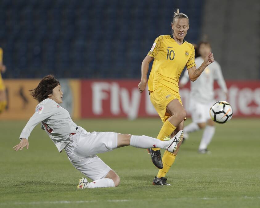 WORKHORSE: Emily van Egmond in action against Japan in the Asian Cup final at the Amman International Stadium, in Amman, Jordan, in April 20. Picture: AP 