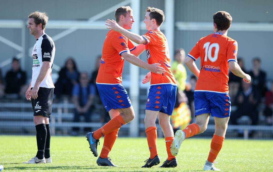 DOMINANT: The Lions celebrate Tommy Jarrard's goal on Saturday at Cooks Square Park against Maitland in the NPL semi-final. Picture: Getty Images