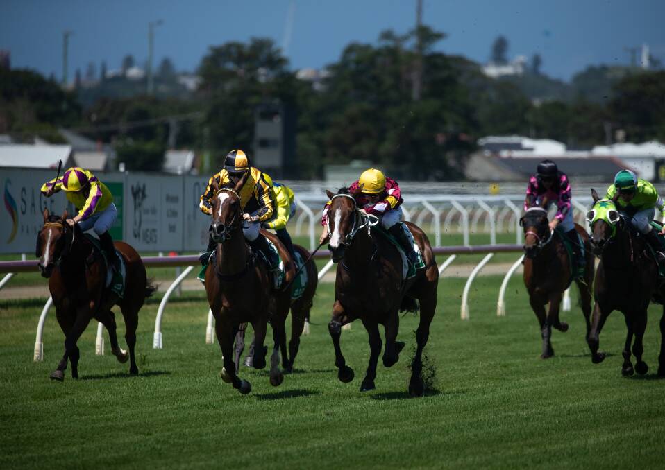 EARLY WIN: Classic Train, second from left, holds off Kerrisdale on its outside to claim race two on Monday at Newcastle for jockey James Innes jnr and trainers Gerald Ryan and Sterling Alexiou. Picture: Marina Neil