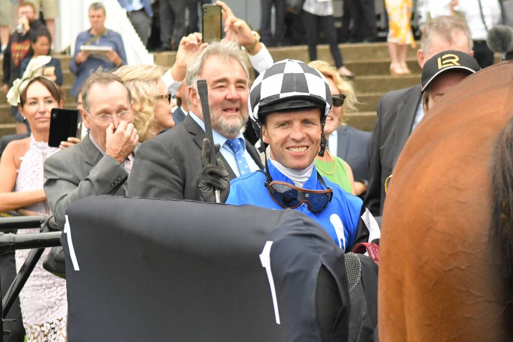 WINNERS' CIRCLE: Jockey Kerrin McEvoy with the happy connections of Kris Lees-trained stayer Red Cardinal after Saturday's victory at Rosehill. Picture: AAP
