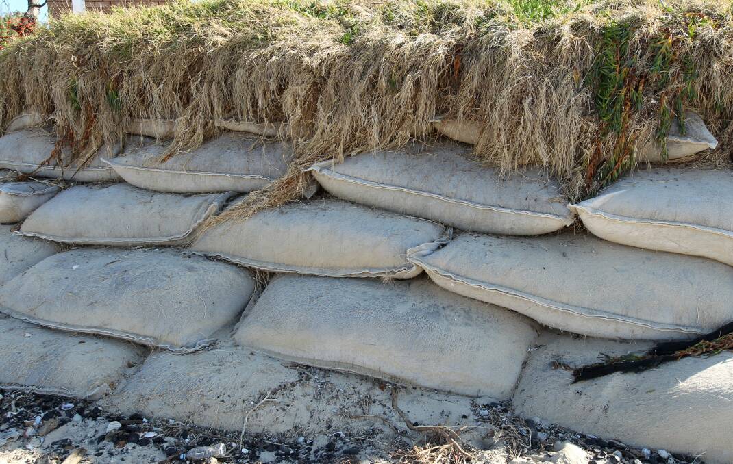 UNRELIABLE: Sand bags are not a satisfactory long-term option for preventing erosion, the lord mayor says.