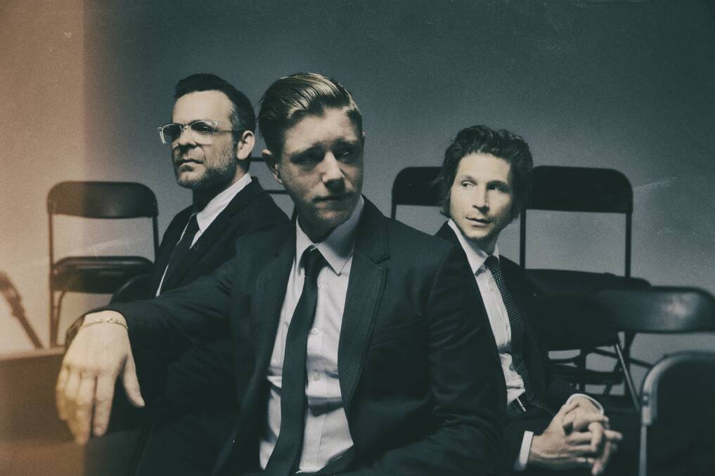 SUITED UP: New York band Interpol maintained their mystique throughout. 