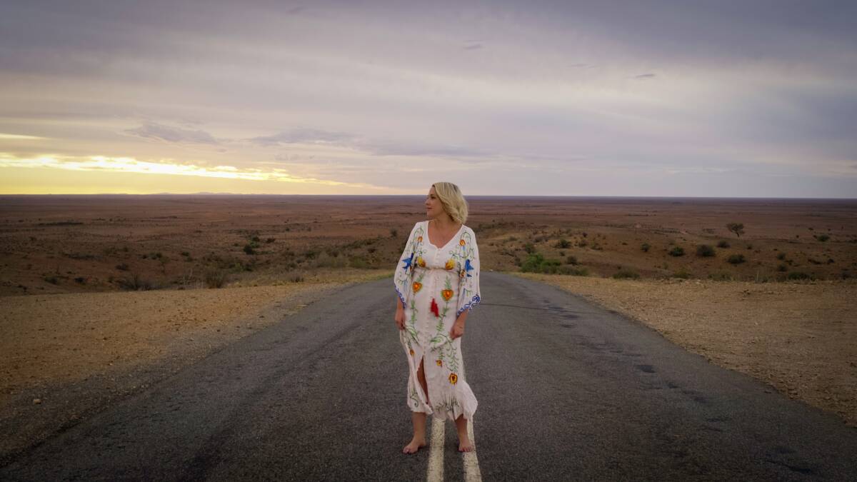 WIDE OPEN ROAD: Catherine Britt has spent the year travelling around the country in a caravan with her husband and son.