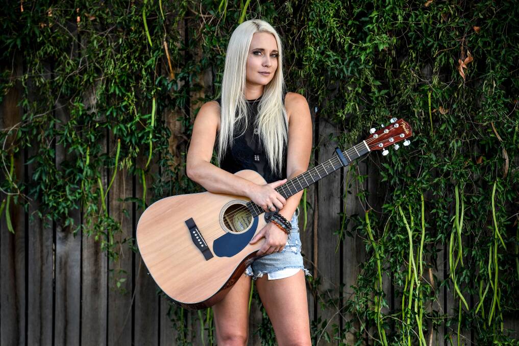 HARD YAKKA: Golden Guitar winner Aleyce Simmonds juggles motel and music management, while guiding her own country music career.