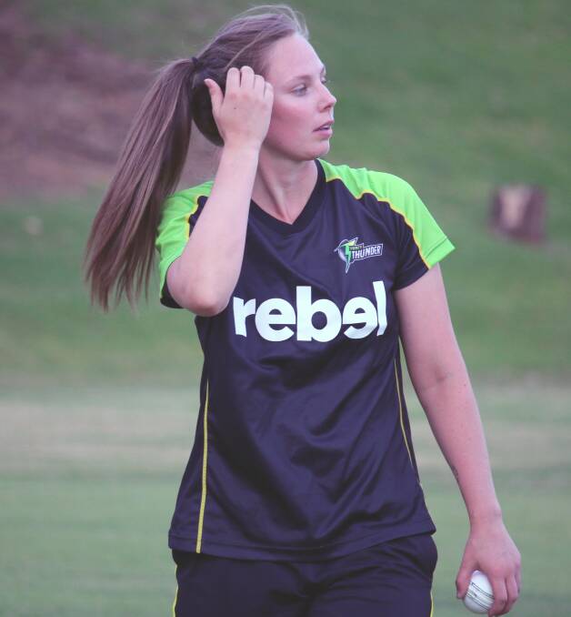 WINNER: Sam Bates took the Thunder's first wicket in WBBL.