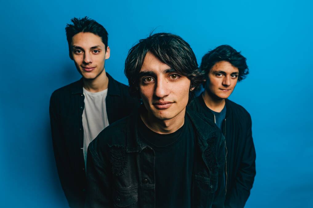 WARMING UP: Lake Macquarie band Snowfish are, from left, Solomon, Jordan and Kalan Rodrigues. They will release their debut single Ghost on Monday.
