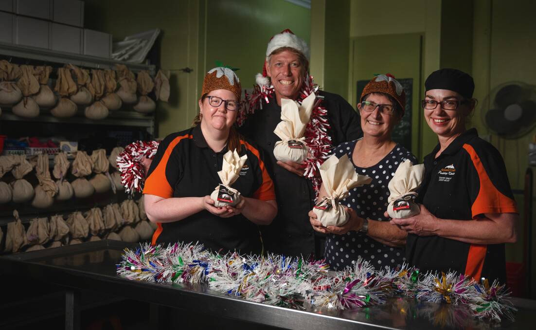 Adamstown Pudding Kitchen is well stocked for Christmas. From left, cooks Rachael Davies, Simon Bruce and Jenine de Plater with volunteer and team leader Janet Newton. Picture by Marina Neil