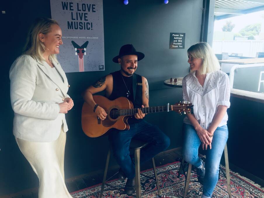 SOUND IDEA: Newcastle lord mayor Nuatali Nelmes with Newcastle musician Javier and licensee Holly Bidwell at Wallsend's Racecourse Hotel on Wednesday. Picture: Josh Leeson