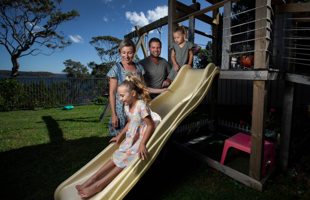 SMILES: Roslyn Jensen and her husband Kris, with their daughters Imogen, 5 and Ebony, 3, are grateful the government's changes will allow Ebony to maintain her childcare place during the COVID-19 crisis. Picture: Marina Neil