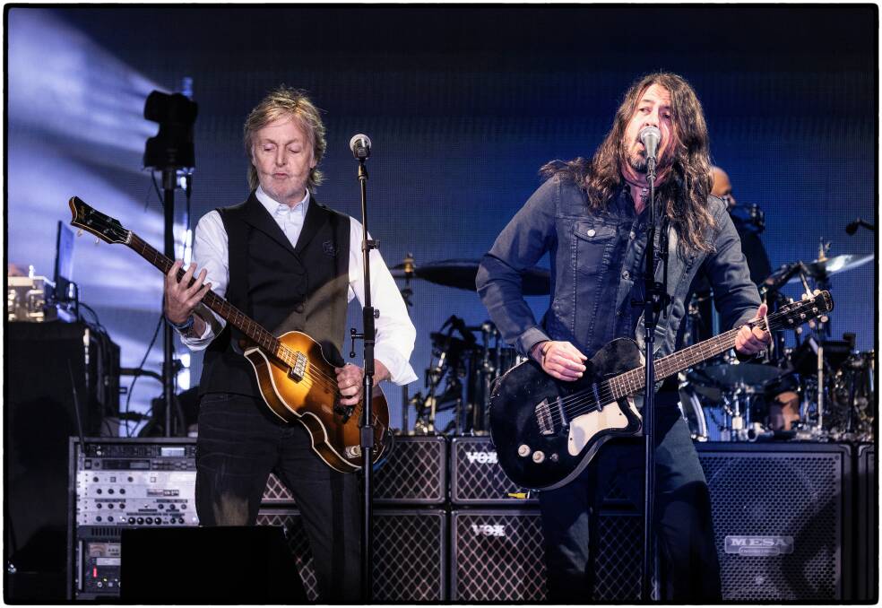 Paul McCartney on stage at Glastonbury Festival last year with Foo Fighters frontman Dave Grohl. Picture by MPL Communications