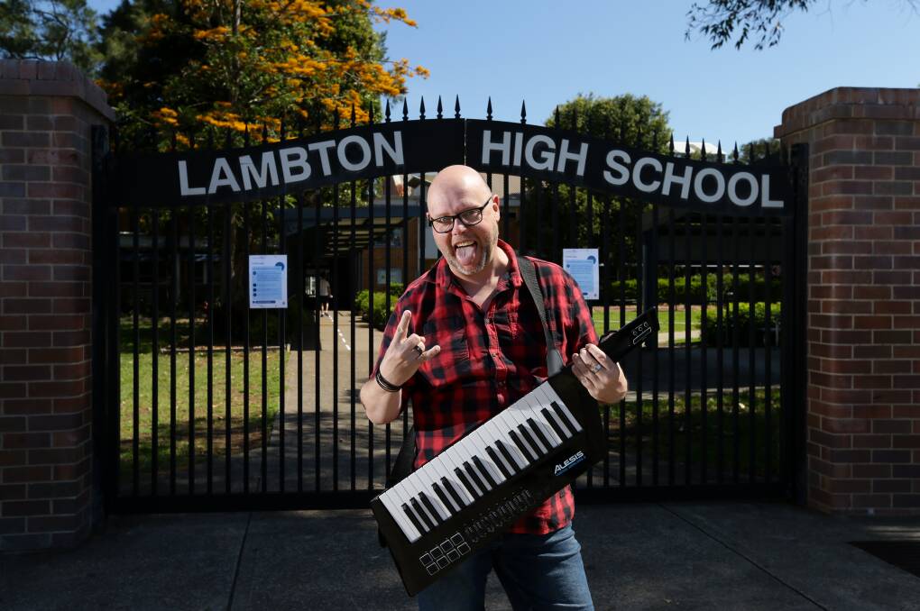 ROCK ON: Lambton High School teacher Daniel Wilson celebrates his ARIA Award nomination. Picture: Marina Neil