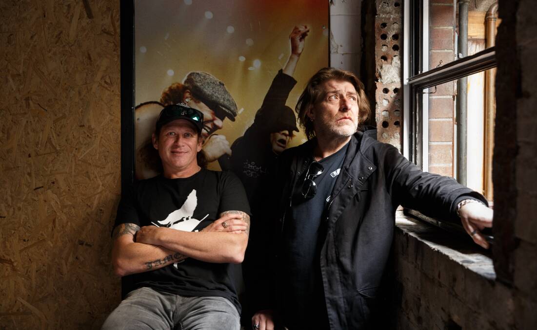 ORIGINALS: Screaming Jets frontman Dave Gleeson and bassist Paul Woseen at the Cambridge Hotel on Tuesday for the Supercars announcement. Picture: Max Mason-Hubers