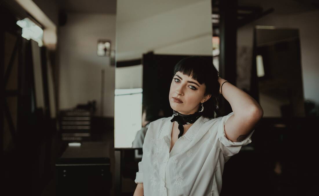 MASK OFF: Newcastle's Demi Mitchell feels her new indie rock direction better represents the artist she has become. Picture: Lazy Bones 
