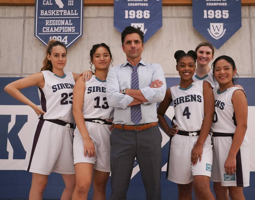 SECOND CHANCE: John Stamos, centre, plays infamous basketball coach Marvyn Korn in Big Shot.