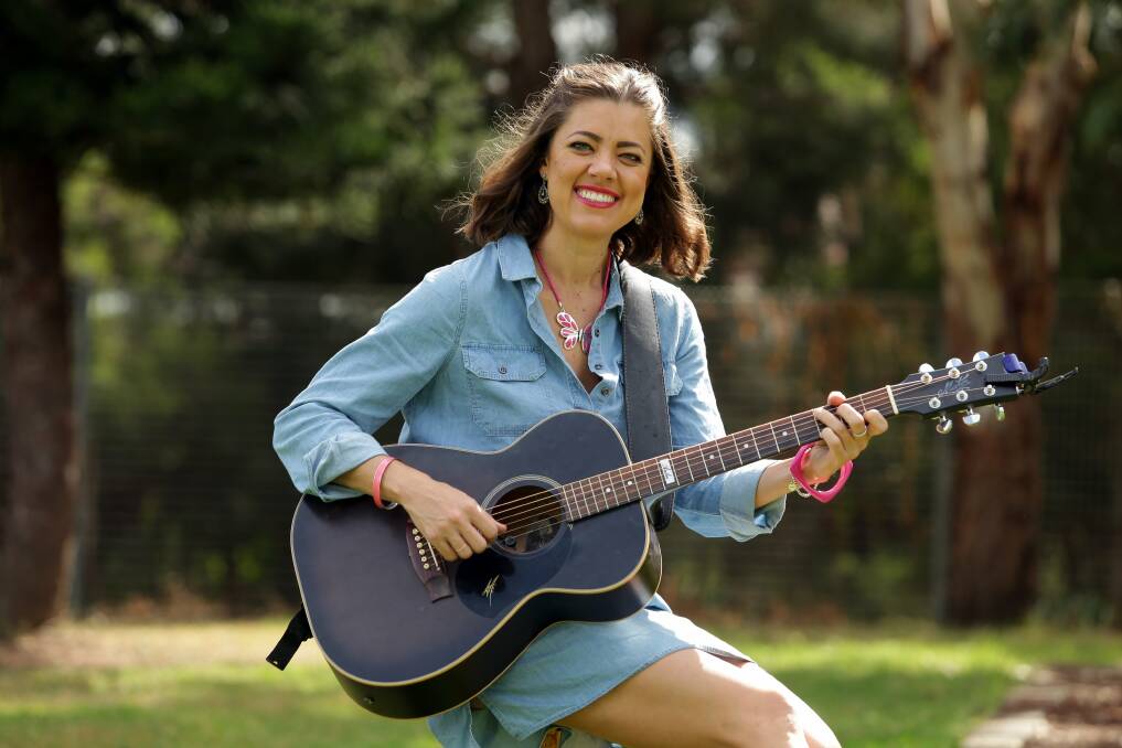 SMILING: Amber Lawrence says her next album will reflect the love and happiness she has discovered with her new family. 