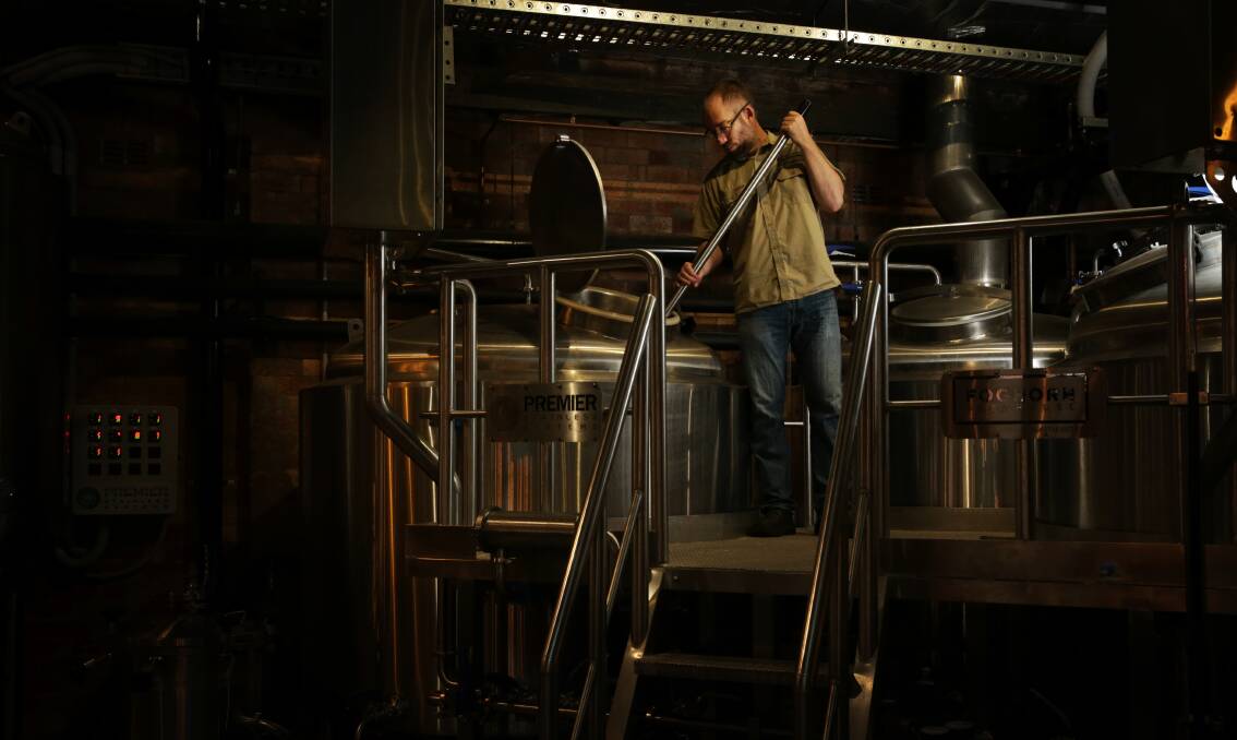 MASH UP: Sherlock brews three 1800-litre batches of beer per week at the FogHorn. Picture: Simone De Peak