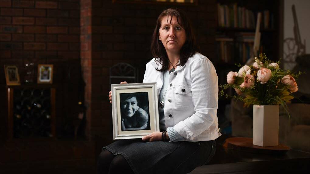  HEARTBREAK: Vicki Richardson, with an image of her daughter Brooke who after just one text while driving. Pictures: MARK JESSER

