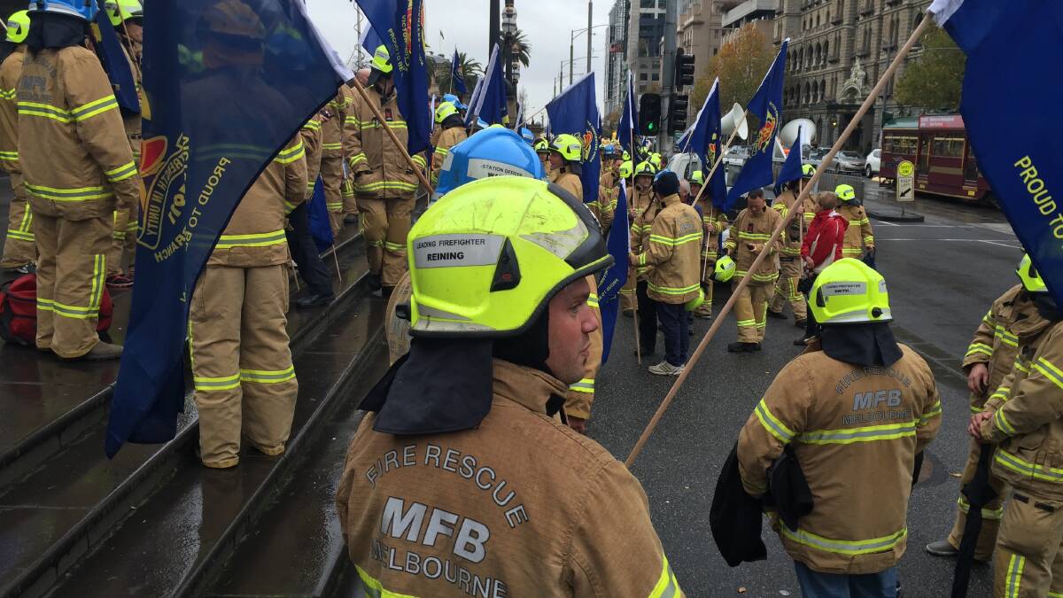 Firefighters rally at Parliament