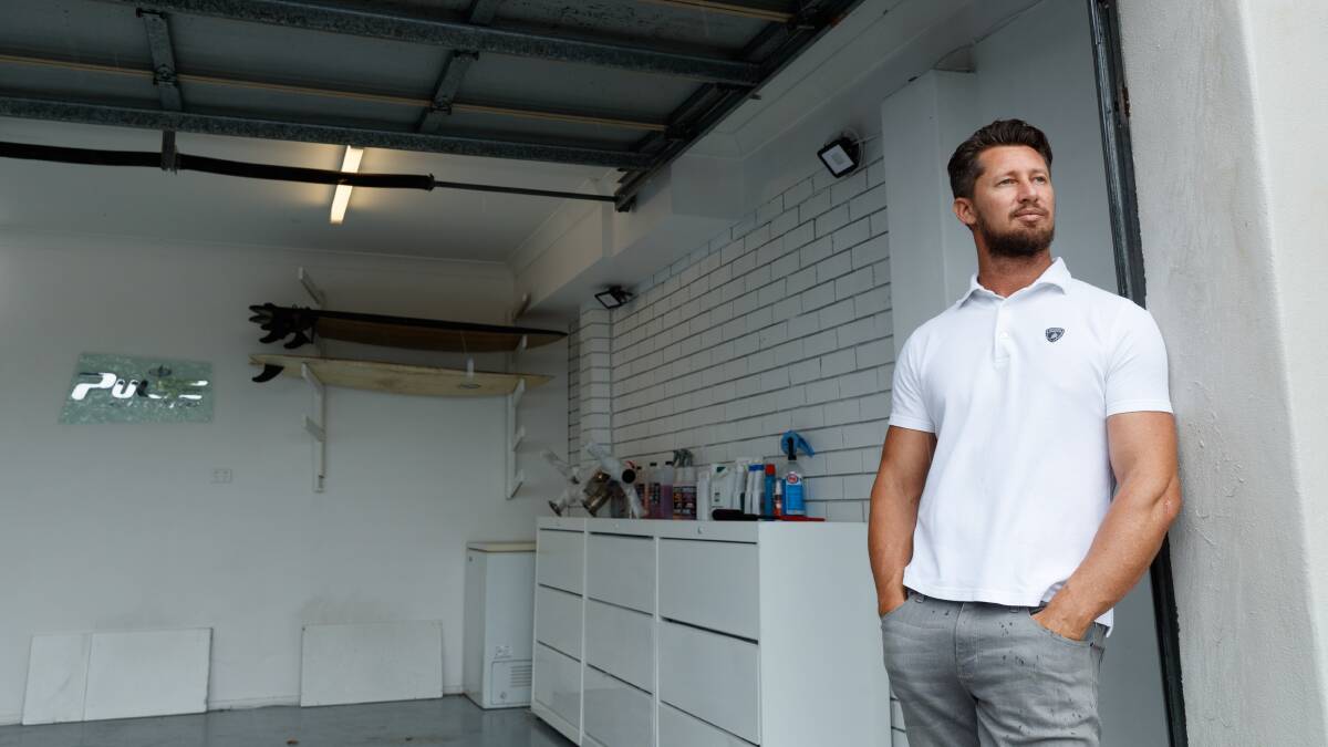 GONE: The owner of the Audi R8, Luke inside his now empty garage. Picture: Max Mason-Hubers
