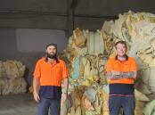 RECYCLING: Soft Landing Newcastle manager Josh Glanville and staff member Ryan Cross. Picture: Supplied