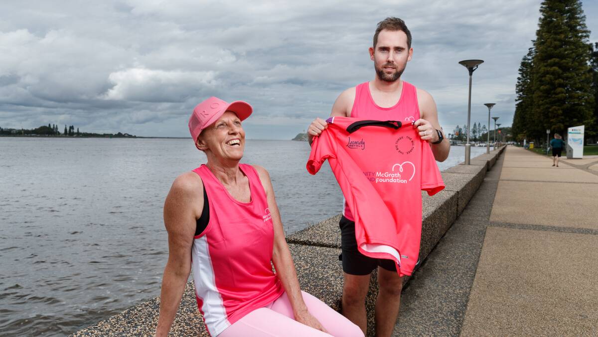 PINK: Karen Maddison and Luke Alexander are taking part in the Big Three Trek from Newcastle to Sydney to raise money for the McGrath Foundation. Picture: Max Mason-Hubers