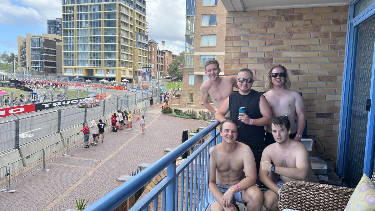 Isaac Smith (bottom right) with friends on the corner of Zaara Street and Shortland Esplanade. Picture by Sage Swinton