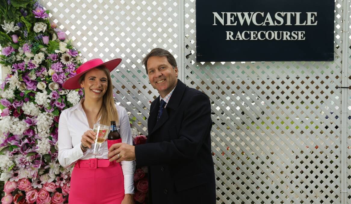 EXCITED: Hunter Breast Cancer Foundation manager Ellie Wells and Newcastle Jockey Club CEO Matt Benson. Picture: Jonathan Carroll