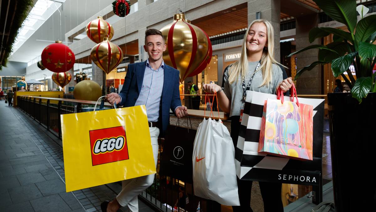 BRANDS: Peter Jackson manager Patrick Skinner and Nike store assistant manager Kaitlyn De Shannon ready for the Boxing Day sales at Charlestown Square. Picture: Max Mason-Hubers