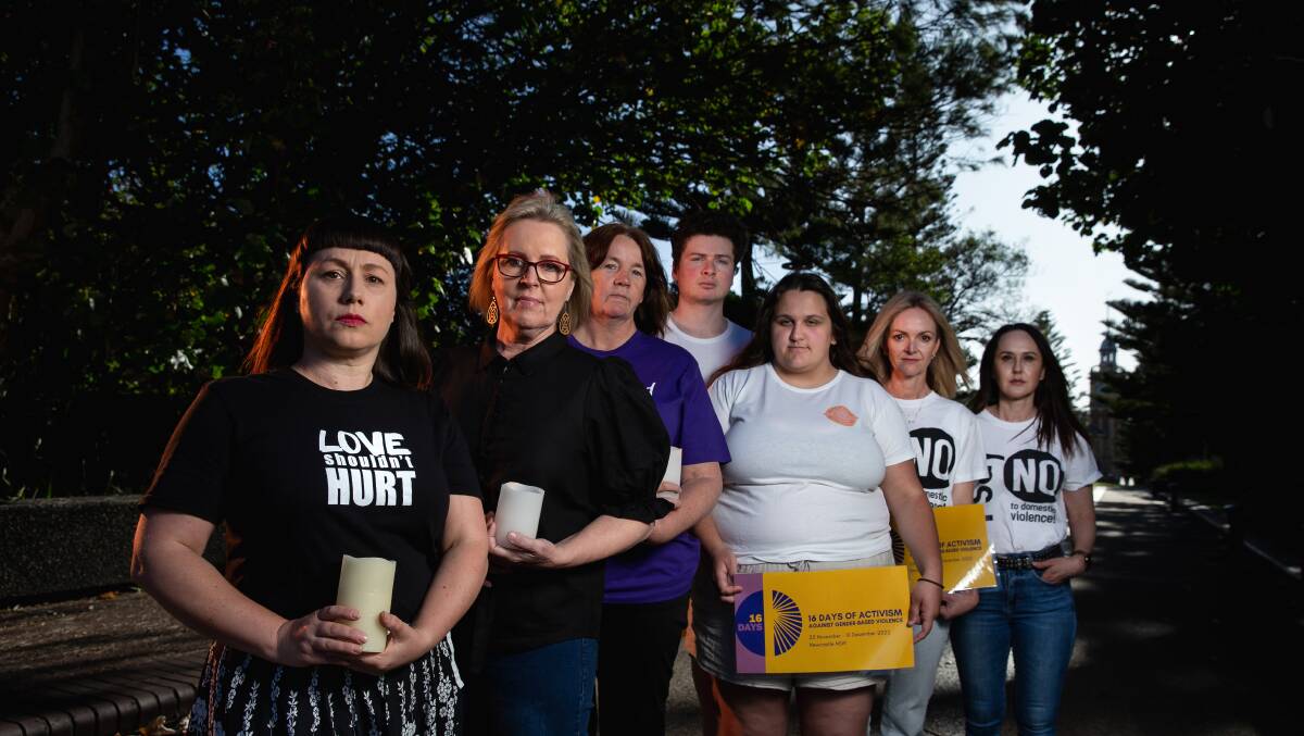 Newcastle Domestic Violence Committee members ahead of the candlelit vigil. Picture by Marina Neil 